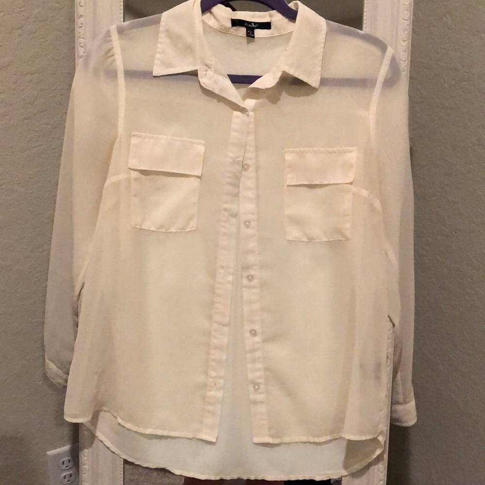beige long sleeved blouse